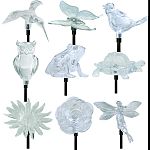 Metal stakes with acrylic topper Seven color-changing led lights illuminate at nightight Assortment includes 4 hummingbirds, 4 fairies, 3 gnomes, 3 lighthouses, 3 owls, 2 birds, 1 sunflower, 1 begonia, 1 butterfly, 1 turtle, 1 frog, 1 dragonfly. Runs up t